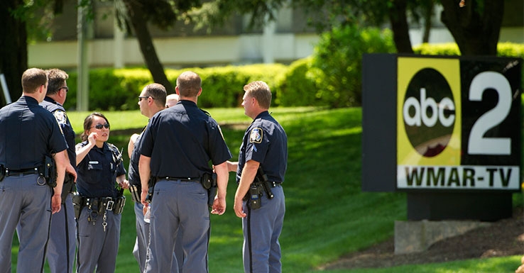 Police outside the scene at WMAR-TV